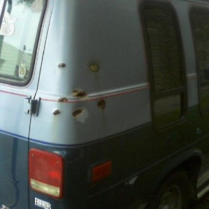 Van with bullet holes