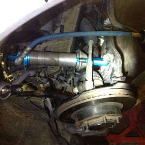 Fully bumped. Total 9" of spindle travel
