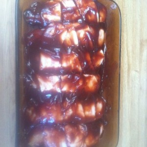 BBQ chicken wrapped in bacon. time to let cook for 6 hours at realll loww s