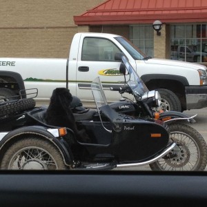 Russian I think. Black dog in the side car.