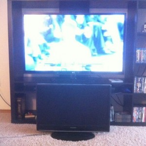 Out with the old (32") in with the new (55" LED). :woot: