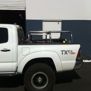 It's pushed back a bit to clear antenna/light bar toward cab