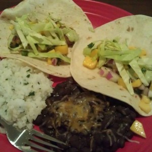 And dinner is served... Baja tacos with cabbage and homemade mango salsa, c