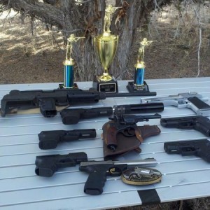 Handguns and trophies.