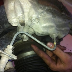 5_Removing_top_bolt_to_caliper_pass_side_