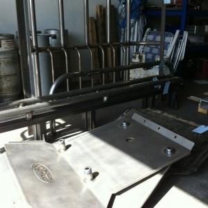 Nice little pile of schtuff going to powdercoat today, skids, sliders, ligh