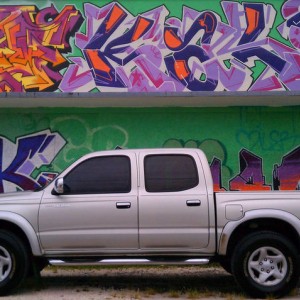 Portrait of my Tacoma in front of a graffiti wall