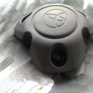 Testing the paint on the caps..going to do rims tomorrow =]
