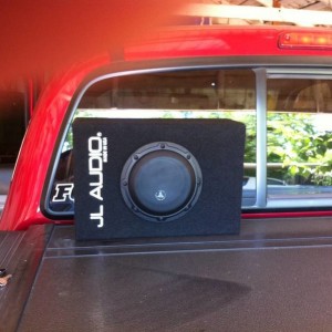 next to rear glass