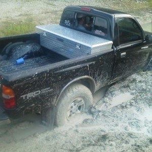 This is sidewinder10 stuck...his front passenger tire dug a hole and he sat
