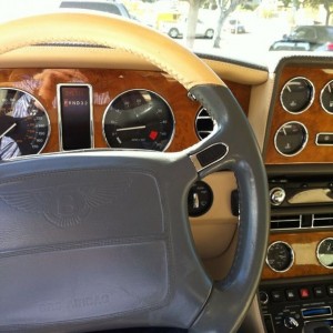 Less buttons. More wood and leather. Drives worse tho