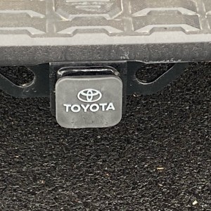 OEM hitch cover with overlay letters