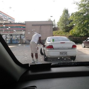 He then realizes something, gets a water bottle from his car and dumps the 