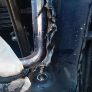 squeaky door issue solved... nut fell off that holds the window track in pl