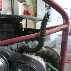 Hand made exhaust. that briggs engine shoots flames with this baby :eek: