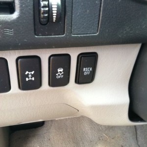 What does the far left button do? Brothers 09 4 runner. (he asked me and I 