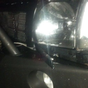 Turn signal filled with water and mud, filler plate ripped out. Also, broke