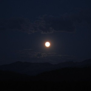 View from the porch. Blue moon rising over the mountains. This picture mess