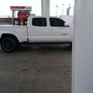 Spotted in Raton, NM. Satoshi with Toyota logo lights behind the grill, low