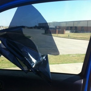 Peeling tint off bc of a effing ticket...