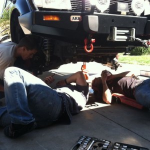 Jim, Silas, and Eric trying to switch out some cv axles