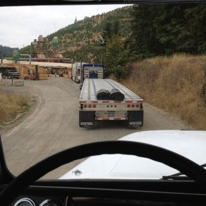 In line to get loaded at a Lumber Mill