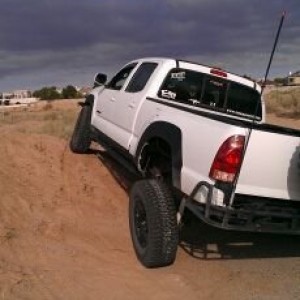 Flexed out with the shackle flip, maxed out the shocks.