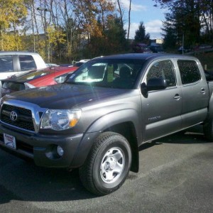 Tacoma sitting in dealer lot (stock)