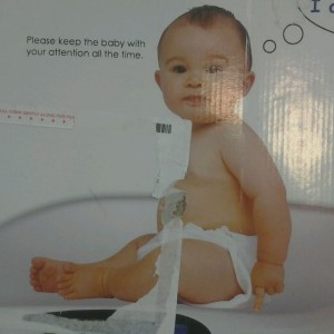 This picture is actually on a box for a childs scale. Do you see whats wron