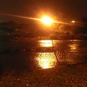 Hard to see but huge waves rolling in river with white caps. Never seen it 