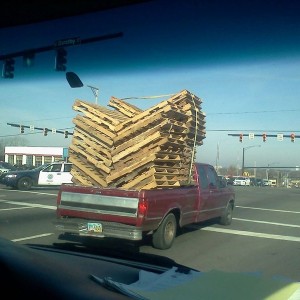 Looks safe. The stack closest to the tail gate doesnt even have a strap on 