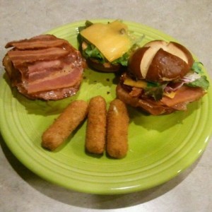Pretzel roll Wasabi Mayo Brown mustard Mixed greens Sharp Cheddar Maple Bac
