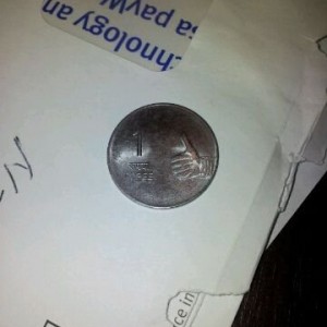 Found 1 Indian Rupee, I wonder if I'm a millionair in Canadian Dollars