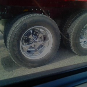 Seen this earlier, dump truck with spinners! LOL white guy driving this tru