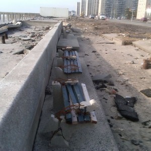 Cement benches with rebar folded over like rubber even behind a poured conc