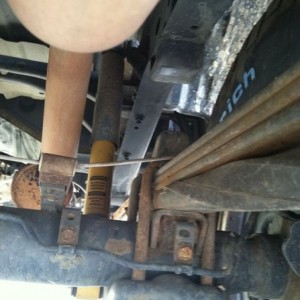 Is this supposed to be sittin on top of my leaf spring?