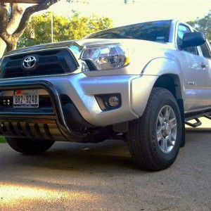 Black bully bar and Nfab nerf bars on my Taco