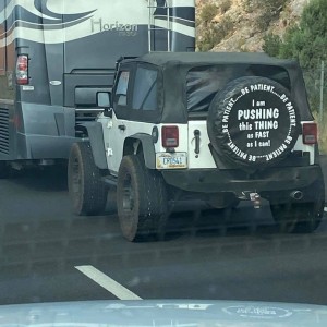Jeep Pushing A Camper