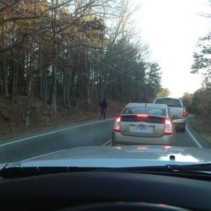 Dude is walking to work faster than I am driving...