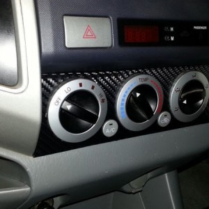 Carbon fiber wrapped climate controls. Working on the shift bezel, but it&#