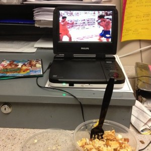 Lunch break at work :). Thai and Burmese kickboxing on a portable DVD playe