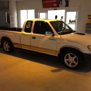 my 98 2wd V6 with 2002 mustang alloy rims! yay!