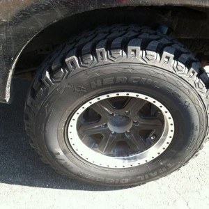 True 32 inch tire. They fill up the wheel well nicely.