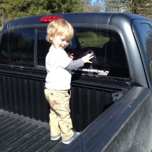My little nephew playin in the taco.