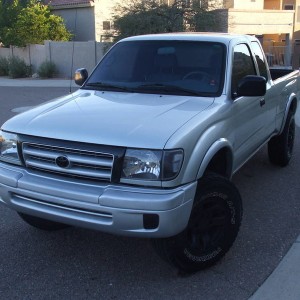 painted bumpers, grille, and fender flares