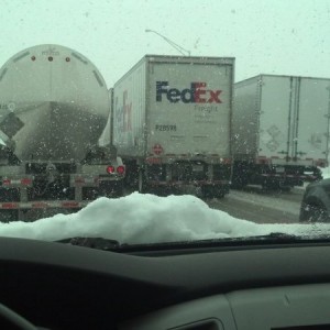 Stupid ass drivers, 2" of snow and a are at a stand still