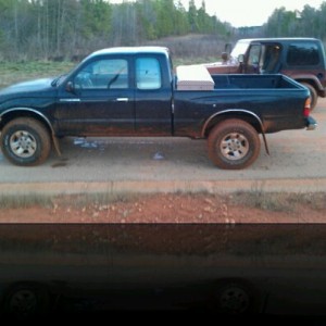 Stock tacoma with some mud