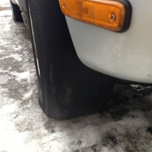 Not a single tread on the tire.