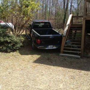 Guy tried to go up a tiny hill at his house. Awesome 2wd f150 didn't q