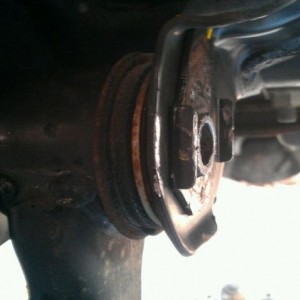 My seized passenger front LCA alignment cam